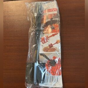 NWT Meat chopper 11” tall, easy grip handle, black plastic dishwasher safe